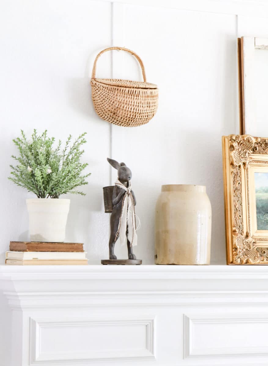 Decorating above our mantel with wicker basket