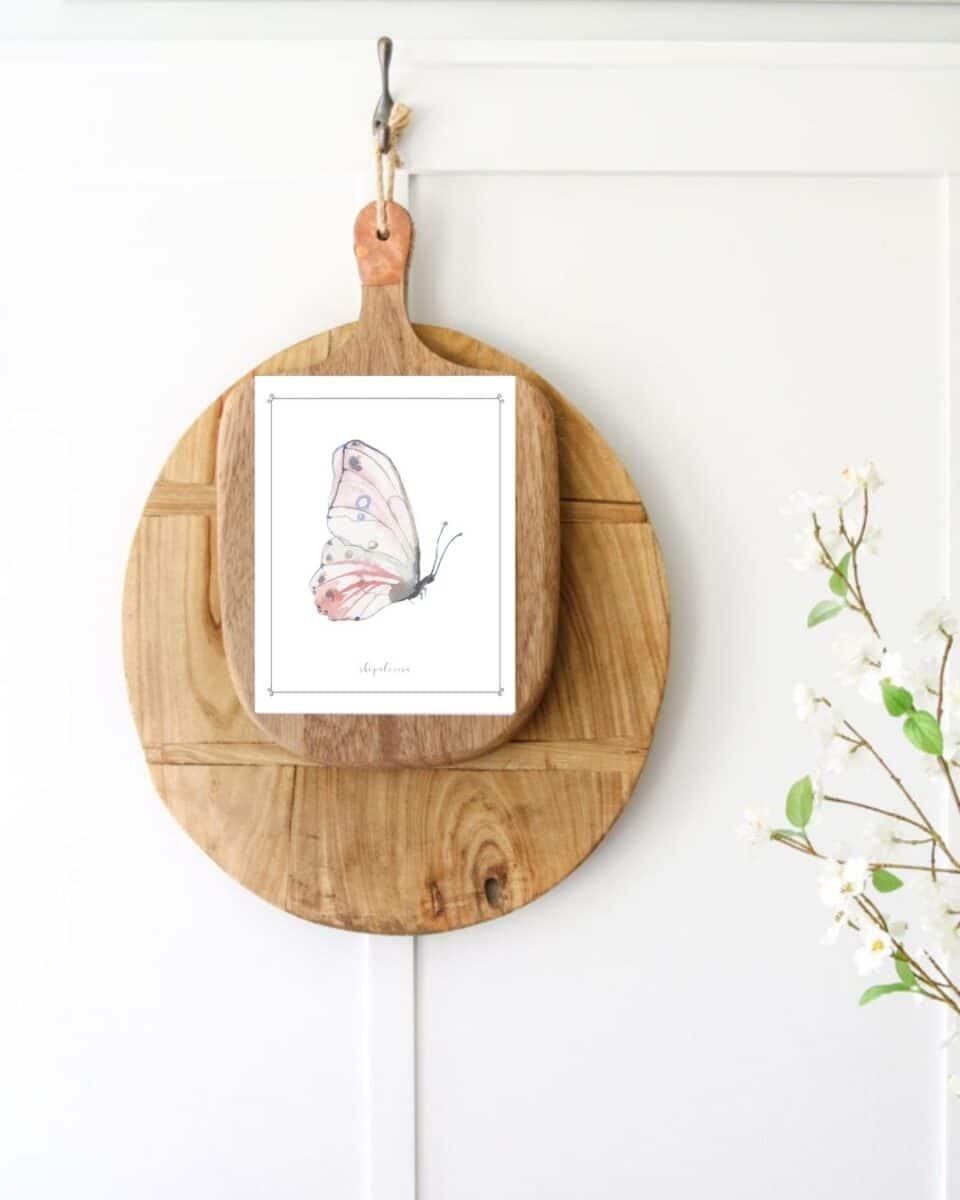 DIY printable idea using a download of a butterfly and taping it to a cutting and bread board