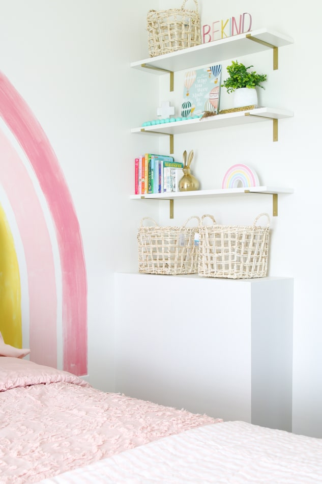 Bookcase in a rainbow bedroom