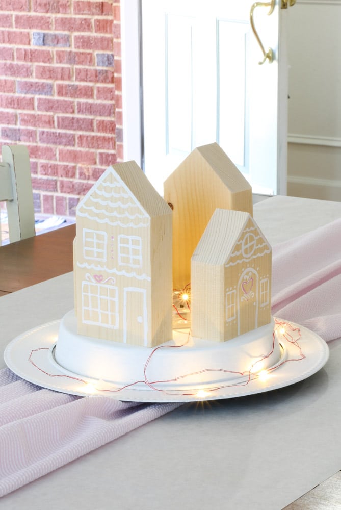 How to make a centerpiece for Valentine's day for the family using gingerbread houses