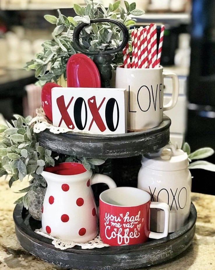Tiered Tray by Farm to Table Creations with xo wood sign, red and white decorative straws and Rae Dunn pieces