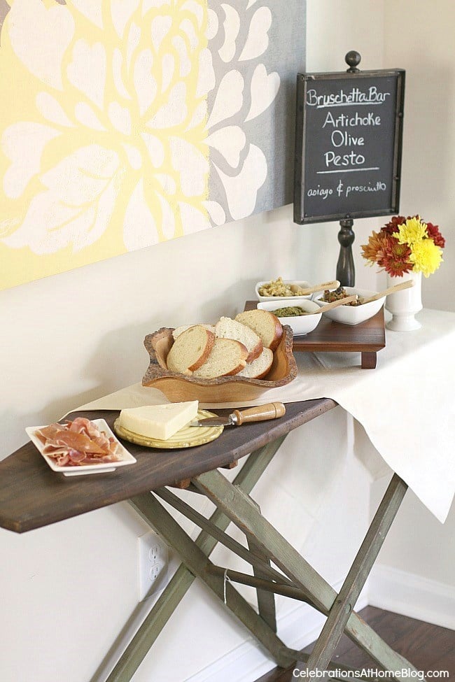 Italian Themed Dinner Party by Celebrations at Home with a antique ironing board with a bruschetta bar on top