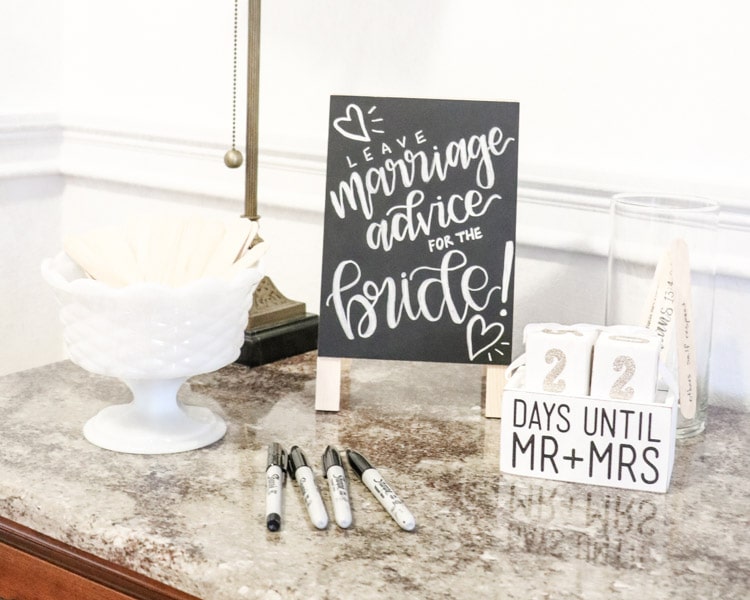 Leave marriage advice for the bride on a jumbo popsicle stick activity for a Southern bridal shower.