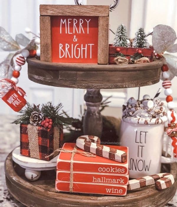 Christmas Tiered Trays by Our Nest Decor with wooden mini stamped books and more on this tiered tray