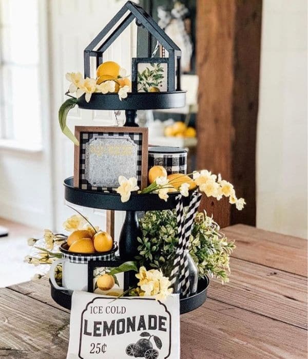 Lemon Décor by Returning Grace with a black tiered tray with a black, white and yellow themed tray