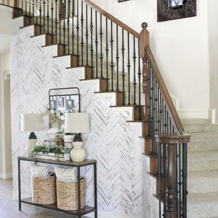 Farmhouse Style Wallpaper by Table for 5 Please with a herringbone patterned wallpaper on her staircase