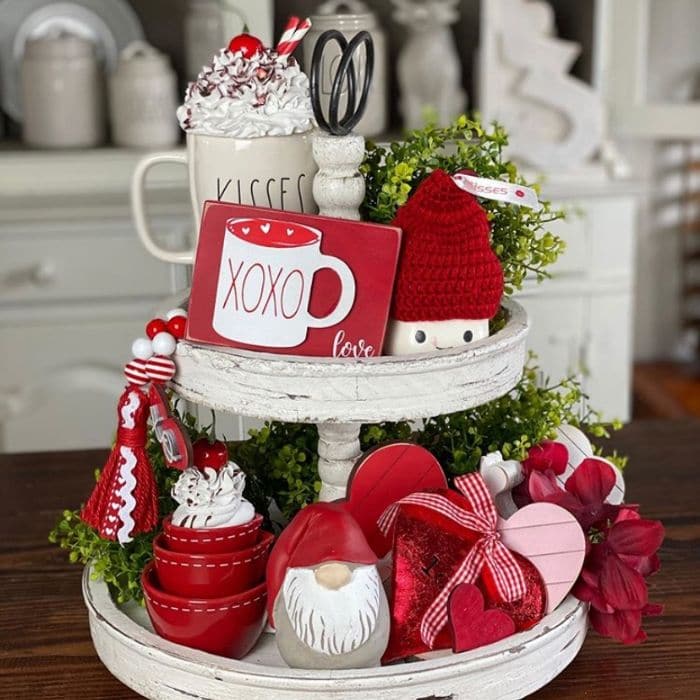 Tiered Tray by Cottage Revivals with a red, white and pink filled Valentine's Day tray