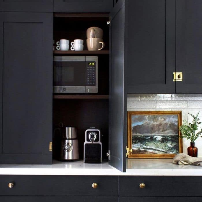 Microwave in cabinet with coffee maker by Beginning In The Middle
