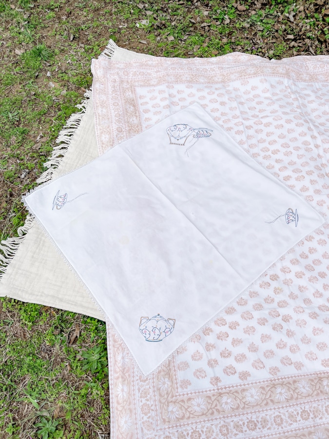Layered tea party picnic blankets and tablescloths