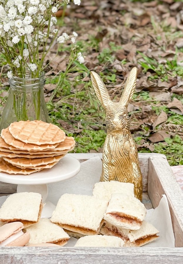 Adding cute decorations like gold bunnies to your tea party decor