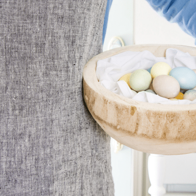 Easter eggs in a wooden bowl that have been dyed with natural ingredients
